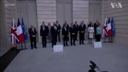 法英峰会在巴黎举行 两国代表团“全家福”合影