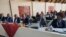 Some youths attending a meeting on development strategies