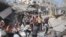 Palestinians look for survivors after the Israeli bombardment of the Gaza Strip in Deir Al-Balah, Oct. 22, 2023.