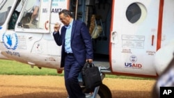 FILE - WHO Director-General Tedros Adhanom Ghebreyesus arrives by helicopter at Ruhenda airport in Butembo, eastern Congo, to visit operations aimed at preventing the spread of Ebola and treating its victims, June 15, 2019.