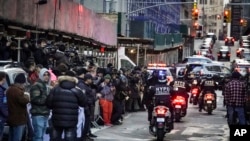 A police motorcycle patrol arrives for added security outside the Manhattan district attorney's office after a grand jury voted to indict former President Donald Trump for his role in paying money to a porn star, March 30, 2023, in New York.