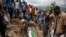 Relatives lay to rest two members of the Haringo family at a cemetery close to the scene of a landslide in Kencho Shacha Gozdi on July 26, 2024.