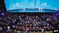 This photograph shows a view of the inside of the European Parliament hemicycle where journalists await the European elections results in the European Parliament in Brussels, June 09, 2024.
