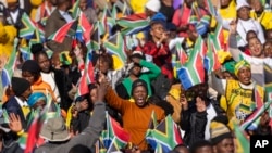 South Africans gather ahead of the inauguration of Cyril Ramaphosa as president at the Union Buildings South Lawns in Pretoria, South Africa, on June 19, 2024.