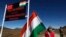 An Indian girl stands with an Indian flag at the India-China border in Bumla, Arunachal Pradesh, on October 21, 2012. India is protesting a new Chinese map that lays claim to India’s territory ahead of next week's Group of 20 summit in New Delhi. (Anupam Nath/AP)