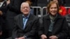 FILE - Former President Jimmy Carter, left, and his wife, Rosalynn, attend an NBA game in Atlanta, Georgia, Feb. 14, 2019. (Dale Zanine-USA Today Sports via Reuters)