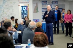 President Joe Biden speaks to supporters during a visit to a campaign field office, in Manchester, New Hampshire, March 11, 2024.