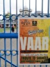 FILE - A poster advertising a tribute for Hardeep Singh Nijjar is displayed at the Guru Nanak Sikh Gurdwara temple in Surrey, British Columbia, Canada, on Sept. 19, 2023. 