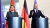 German Chancellor Olaf Scholz and Swiss Confederation President Viola Amherd speak with reporters in Berlin, Germany, about a planned Ukraine peace summit, May 15, 2024.