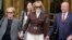 E. Jean Carroll, center, walks out of Manhattan federal court in New York, May 9, 2023. A jury has found Donald Trump liable for sexually abusing the advice columnist in 1996, awarding her $5 million.