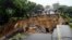 FILE: A road connecting the two cities of Blantyre and Lilongwe is seen damaged following heavy rains caused by Tropical Cyclone Freddy in Blantyre, Malawi, March 14 2023.