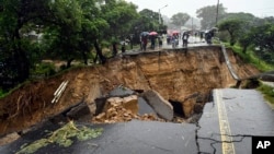 A road connecting the two cities of Blantyre and Lilongwe is seen damaged following heavy rains caused by Tropical Cyclone Freddy in Blantyre, Malawi, March 14 2023.