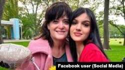 하마스에 억류됐다가 20일 석방된 것으로 알려진 미국인 주디스 라난(왼쪽) 씨와 딸 나탈리 라난 양. 나탈리 라난 양의 고등학교 졸업식 때 찍은 사진으로 가족들이 제공했다.