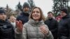 FILE - Moldovan President Maia Sandu attends a rally and concert, celebrating the European Union's decision to open membership talks with Moldova, in Chisinau, Dec. 17, 2023. 