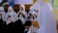 In this handout photo provided by the Sahamiye Foundation, high school girls are seen participating in the ''Daariz'' speed reading competition held in Hargeysa, Somaliland. 