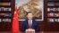 In this photo released on Dec. 31, 2023 by Xinhua News Agency, Chinese President Xi Jinping delivers a New Year message in Beijing to ring in 2024.