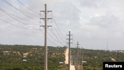 FILE - Electrical power lines from the Benadir Electricity Company (BECO) solar project in the outskirts Mogadishu, May 21, 2020.