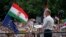 Peter Magyar, a rising challenger to Hungarian Prime Minister Viktor Orban, addresses people at a campaign rally in the rural city of Debrecen, Hungary, May 5, 2024. 