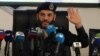 (FILE) The Minister of Interior of the Libyan National Unity Government Imed Trabelsi, speaks at a press conference in Tripoli on March 22, 2024.