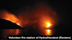 A general view of a forest fire on the island of Hydra, Greece June 21, 2024.