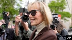 FILE - E. Jean Carroll, who alleges Donald Trump raped her in a department store in 1996, arrives at Manhattan Federal Court, in New York, May 9, 2023. 