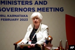 U.S. Treasury Secretary Janet Yellen reads a statement on the sidelines of G-20 financial conclave on the outskirts of Bengaluru, India, Feb. 24, 2023.