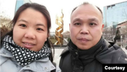 资料照：中国著名人权律师余文生和妻子许艳 （照片来自维权网）