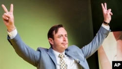 FILE - N-VA leader Bart De Wever arrives to address party members after winning the Belgian federal and regional elections, in Brussels, May 25, 2014. He resigned Aug. 22, 2024, as leader of government coalition talks.