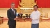 This photograph taken and released on Aug. 14, 2024, by the Myanmar Military Information Team shows Myanmar's military chief Min Aung Hlaing, right, meeting with China's Foreign Minister Wang Yi in Naypyidaw. 