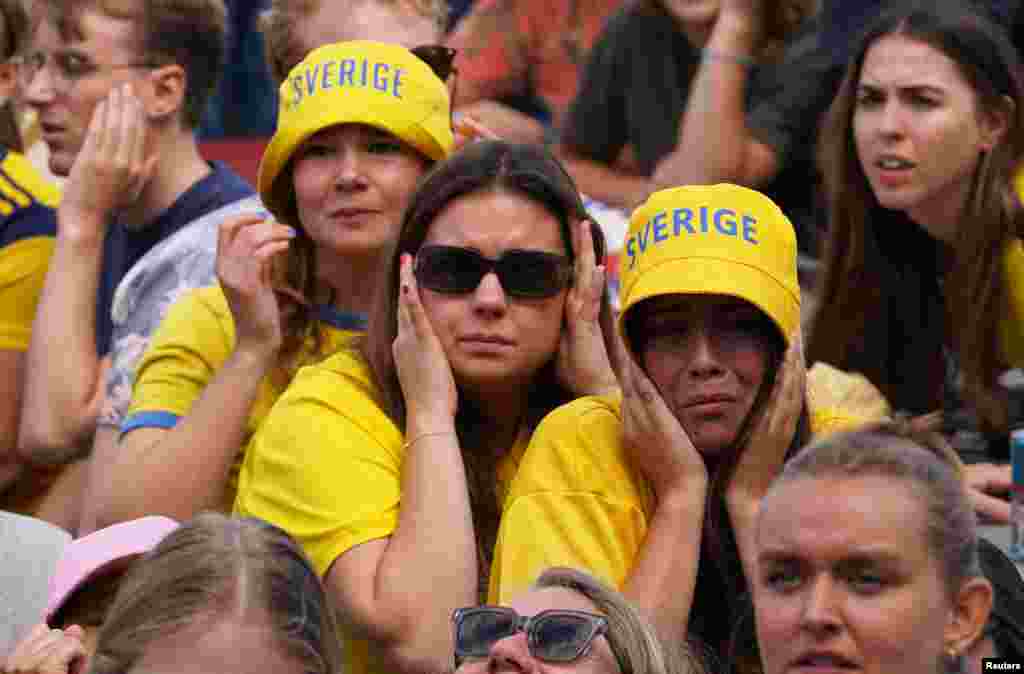 Fans in Stockholm react as they watch the semifinal match between Spain vs. Sweden during the FIFA Women&#39;s World Cup Australia and New Zealand.