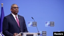 US Defense Secretary Lloyd Austin attends a news conference during a NATO defense ministers' meeting at the Alliance's headquarters in Brussels, Feb. 15, 2023.
