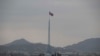 FILE - A North Korean flag flutters in Gijungdong, as seen from a South Korean observation post inside the demilitarized zone in Paju, South Korea, during a media tour, March 3, 2023. The United States wants China to do more to monitor North Korean sanctions violations. 