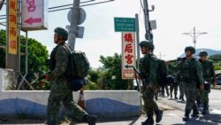 士兵們在台灣桃園參加一年一度的漢光軍演的第一天。 （2024年7月22日）