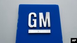 GM logo - Job Cuts