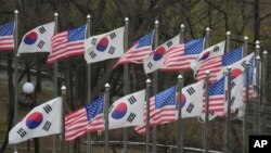 FILE - Flags of South Korea and the United States flutter at the Imjingak Pavilion in Paju, South Korea, near the border with North Korea, April 11, 2023.
