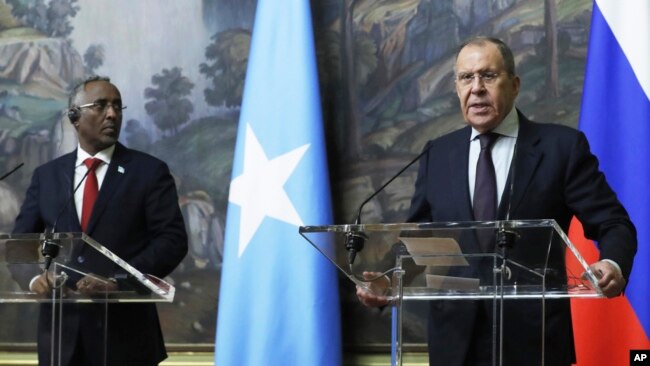 Russian Foreign Minister Sergey Lavrov, right, and Somali Foreign Minister Abshir Omar Jama attend a joint press conference following their talks in Moscow, May 26, 2023.