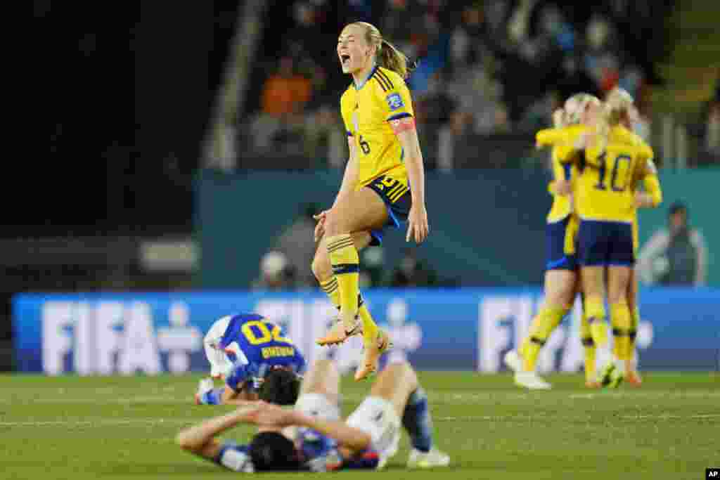 Sweden&#39;s Magdalena Eriksson celebrates at the end of the Women&#39;s World Cup quarterfinal soccer match between Japan and Sweden at Eden Park in Auckland, New Zealand.