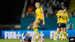 Sweden&#39;s Magdalena Eriksson celebrates at the end of the Women&#39;s World Cup quarterfinal soccer match between Japan and Sweden at Eden Park in Auckland, New Zealand.