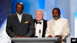 FILE - From left, Louis Gossett Jr., Ed Asner and Ben Vereen speak onstage at the 45th NAACP Image Awards at the Pasadena Civic Auditorium in Pasadena, California, Feb. 22, 2014.