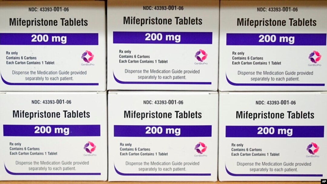 FILE - Boxes of the drug mifepristone sit on a shelf at the West Alabama Women's Center in Tuscaloosa, Ala., on March 16, 2022.