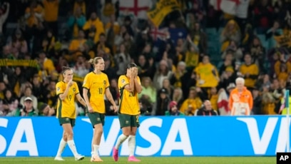 Australia's Caitlin Foord, Emily Van Egmond and Sam Kerr walk after the Women's World Cup semifinal soccer match between Australia and England at Stadium Australia in Sydney, Australia, Aug. 16, 2023.