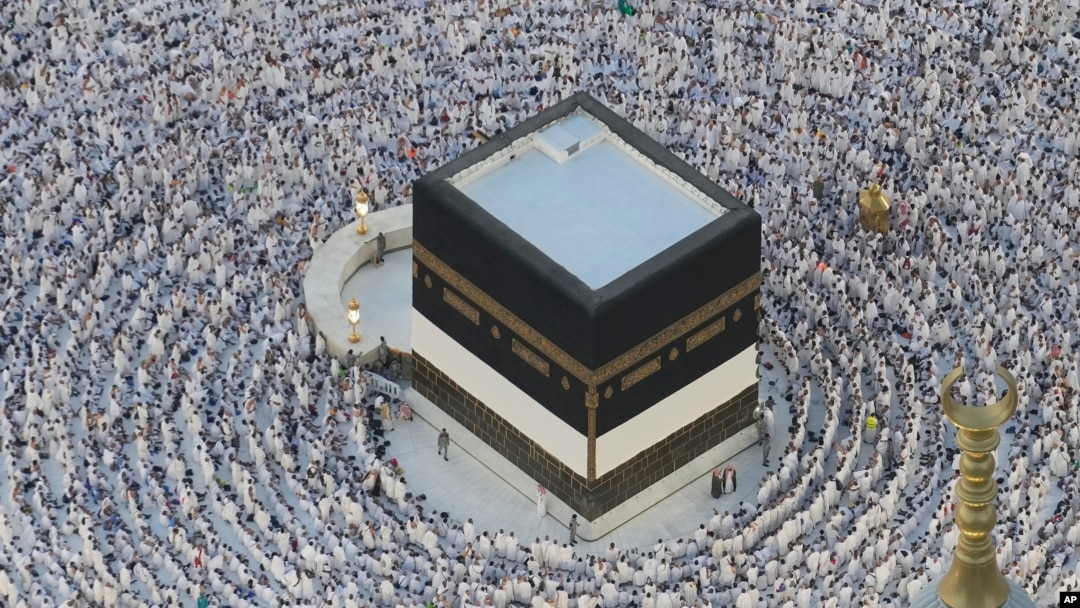Muslim pilgrims circumambulate the Kaaba, the cubic building at the Grand Mosque, during the annual Hajj pilgrimage in Mecca, Saudi Arabia, June 11, 2024.