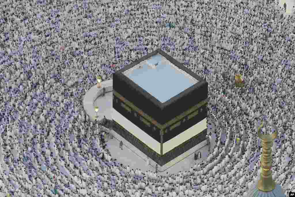 Muslim pilgrims circumambulate the Kaaba, the cubic building at the Grand Mosque, during the annual Hajj pilgrimage in Mecca, Saudi Arabia, June 11, 2024.