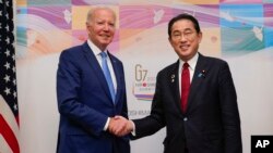 FILE - President Joe Biden greets Japan's Prime Minister Fumio Kishida ahead of a bilateral meeting in Hiroshima, May 18, 2023. Biden will host the Japanese leader for an official visit to the United States on April 10, 2024, the White House said January 25. 