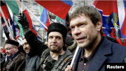 FILE - Russia-supporting Ukrainian entrepreneur Oleg Tsaryov, right, is shown in Russian-controlled Donetsk in an image taken from undated video. Tsaryov was shot and seriously wounded on Oct. 26, 2023.