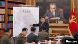 North Korean leader Kim Jong Un attends the 7th enlarged meeting of the 8th Central Military Commission of the Workers' Party of Korea, in Pyongyang, North Korea, Aug.9, 2023. (KCNA via Reuters)