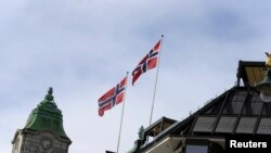 ILUSTRASI - Bendera Norwegia berkibar di atas gedung-gedung di Oslo, Norwegia, 31 Mei 2017. 9REUTERS/Ints Kalnins)