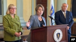 Massachusetts Gov. Maura Healey announces new rules for families in overflow shelter sites, March 25, 2024, at the Massachusetts Statehouse in Boston.