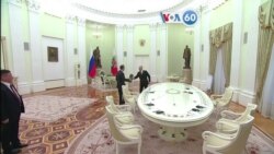 Manchetes mundo 22 fevereiro: Vladimir Putin encontrou-se com Wang Yi no Kremlin