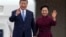 China's President Xi Jinping and his wife Peng Liyuan wave upon their arrival for an official two-day state visit at Orly airport, south of Paris on May 5, 2024. 